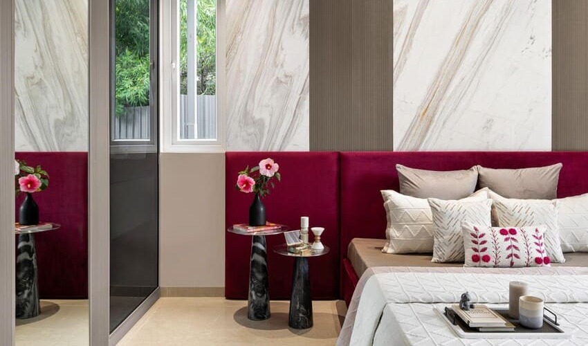 Cozy bedroom with personalized décor, custom art, and warm layered textures.